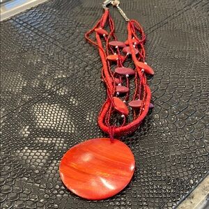 Elegant Red Necklace with Shell Pendant